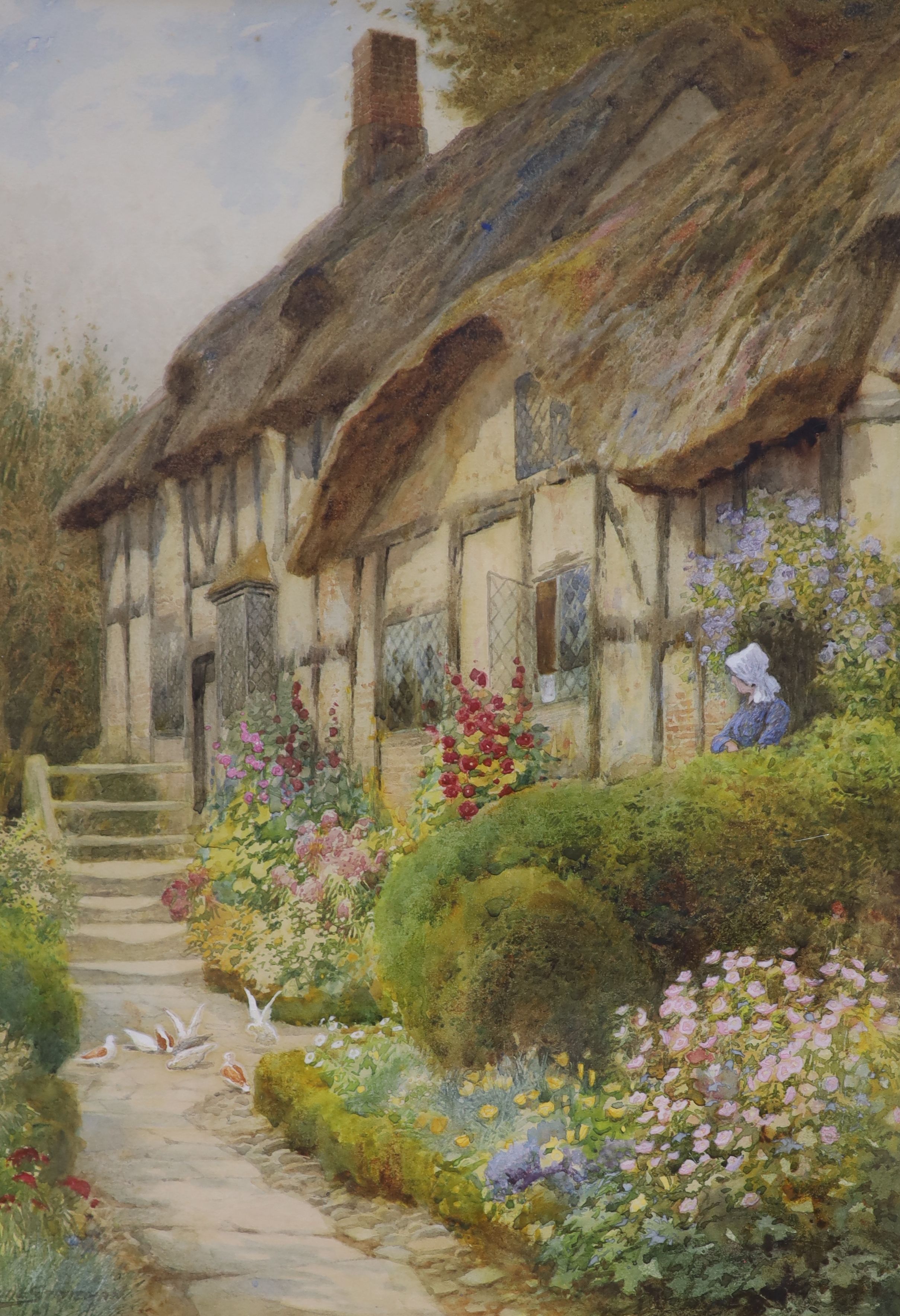 Arthur Claude Strachan, (Scottish, 1865-1938), watercolour, Thatched cottage and garden, Evesham, signed, 36 x 26cm